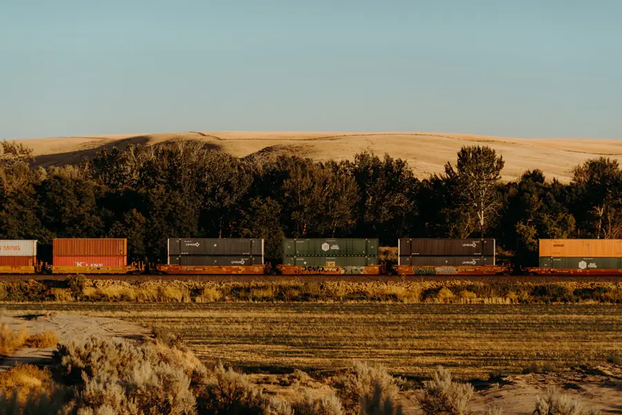 Freight train carrying shipping containers